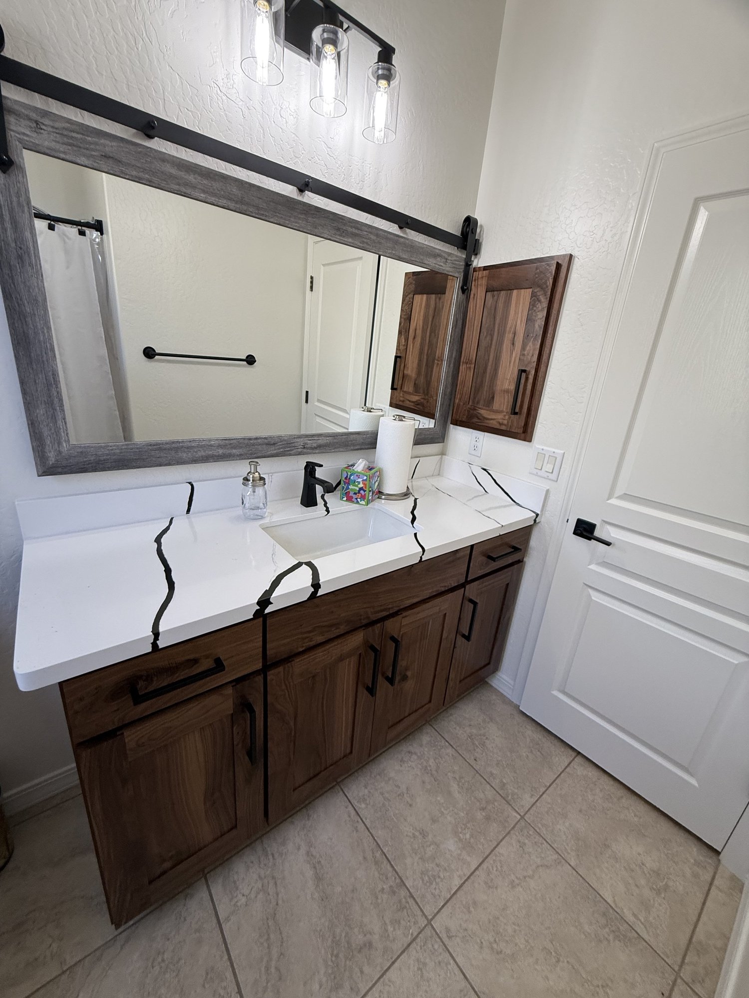 Modern kitchen with custom hood — Add-More-Cabinets install